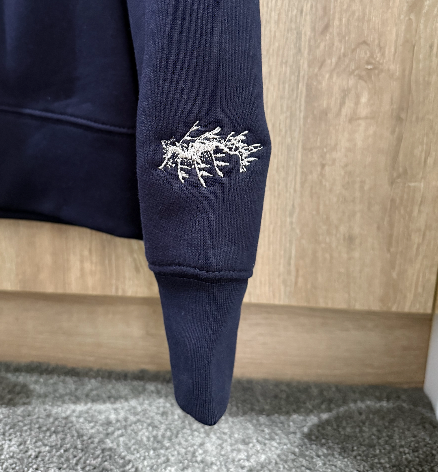 Tumby Bay Leafy Sea Dragon Embroidered Wave Women's Navy Relaxed Crew Jumper