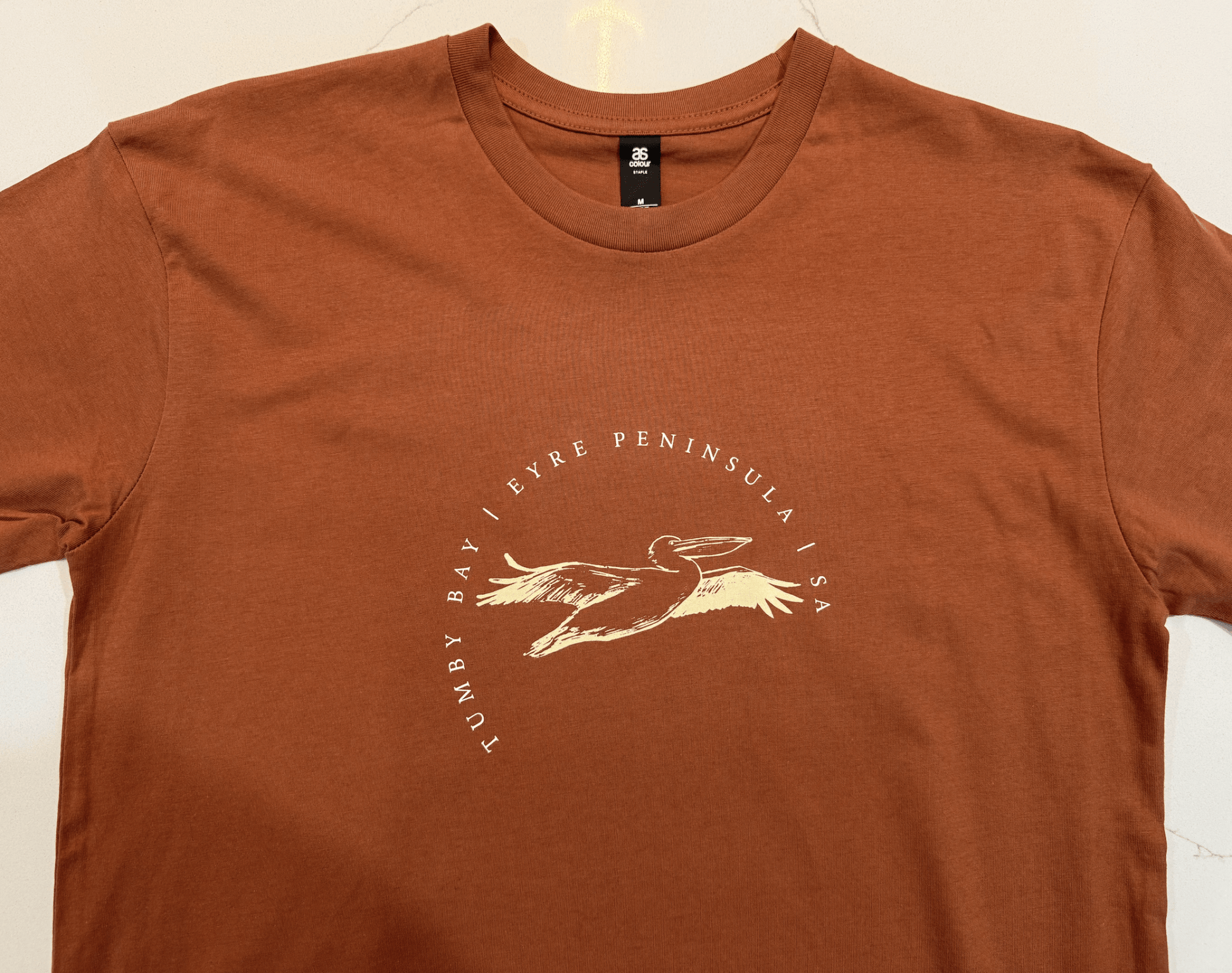 Tumby Bay Flying Pelican Tee Unisex - Land to Coast