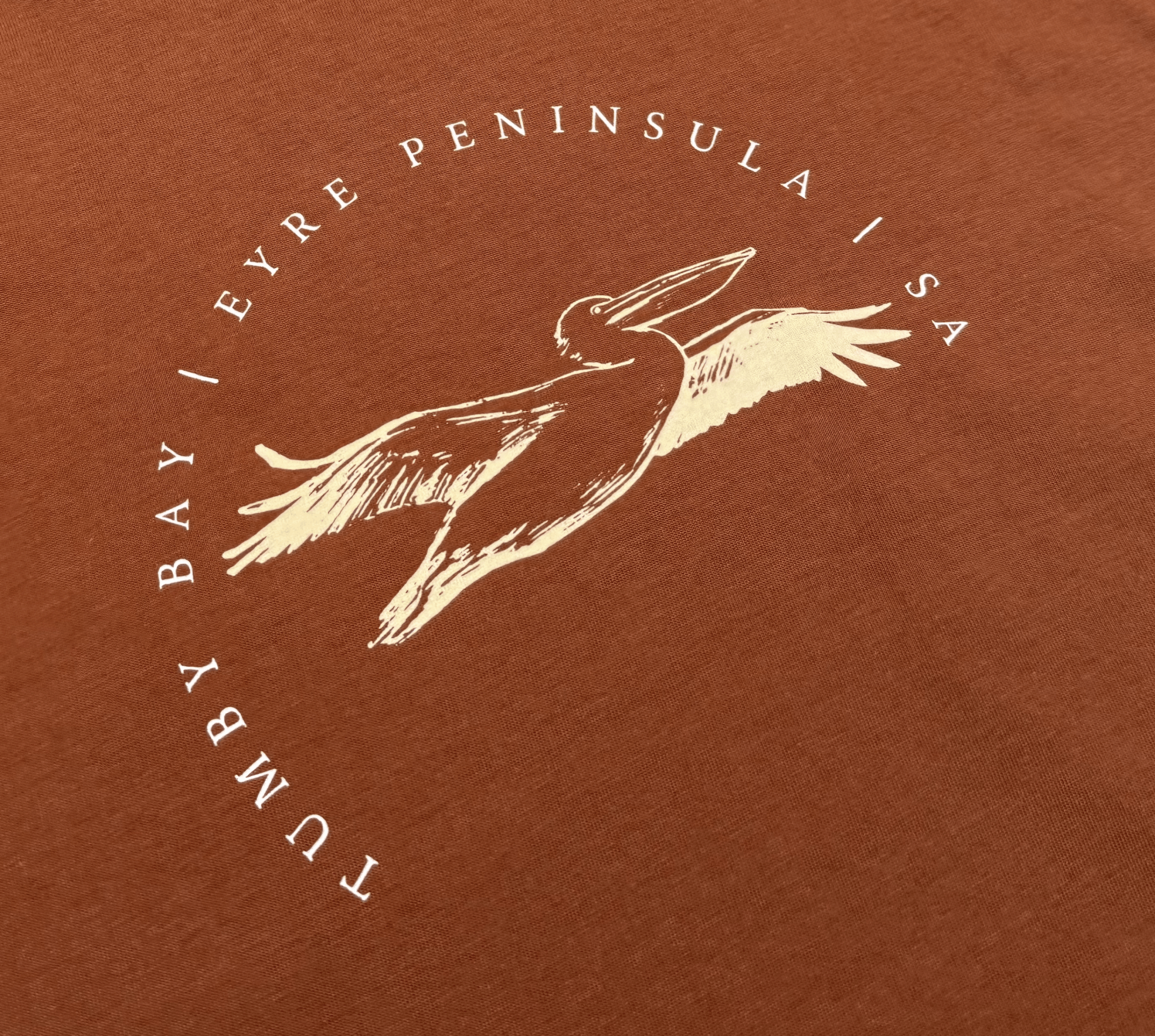 Tumby Bay Flying Pelican Tee Unisex - Land to Coast